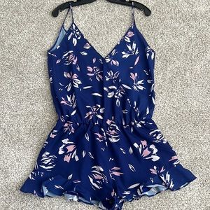 Navy blue flowered romper (size Medium)